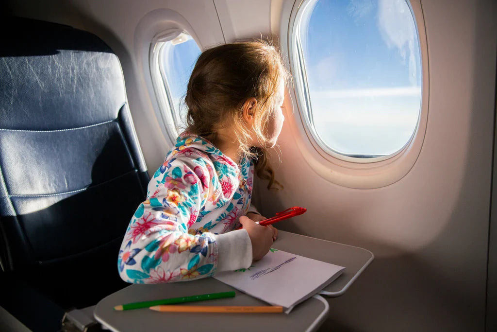 Top 10 Long-Haul Flight Survival Tips for Parents Traveling with Kids